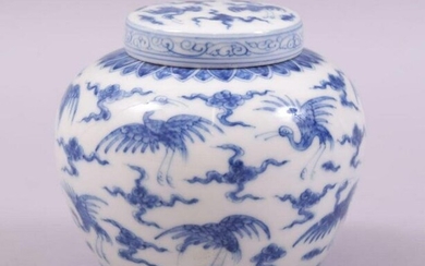 A SMALL CHINESE BLUE AND WHITE PORCELAIN JAR AND COVER