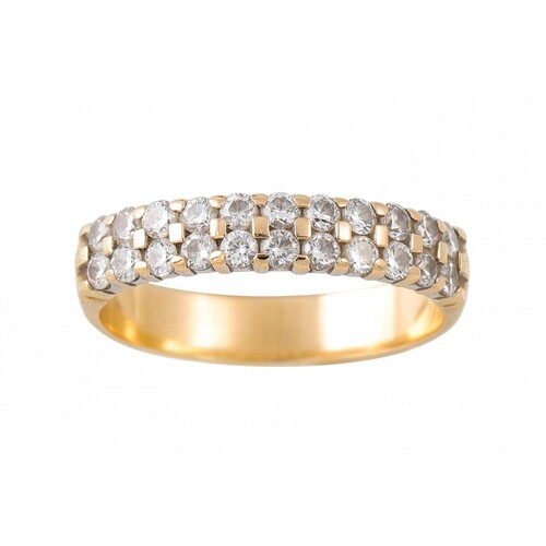 A TWO ROWED DIAMOND RING, the brilliant cut diamonds mounted...