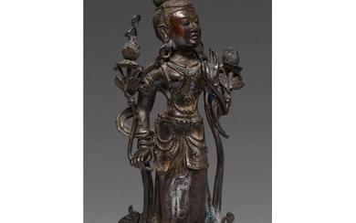 A Tibetan bronze figure of Guanyin, 19th c, on lotus base, s...