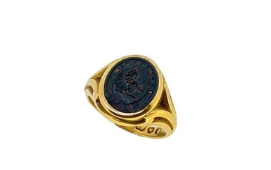 A Victorian 18ct gold bloodstone signet ring, oval shaped head, approximately 15 x 12.5mm, set with