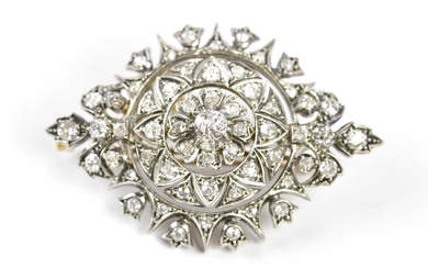 A Victorian yellow metal diamond set combination brooch/pendant, the pierced...