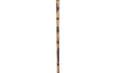 *A WOODEN WALKING CANE, with carved stag antler handle wit...