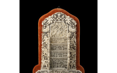 A carved ivory cards holder, on velvet panel (slight defects) China, Canton, early 20th century (h. 27.5 cm.) This...