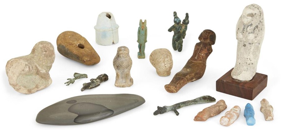 A collection of Egyptian antiquities and later items, including an ushabti, a 20th Dynasty amulet of Anubis, and a Roman-Egyptian bronze Harpocrates (14) Provenance: The ushabti from the ex-J.D.R. Fryer Collection UK with an old label "Ament-em...