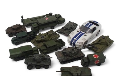 A collection of model military vehicles, largely by Dinky, t...