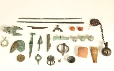 A collection of small, various objects; metal, bone,...