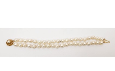 A double strand cultured pearl bracelet with a hallmarked 9c...