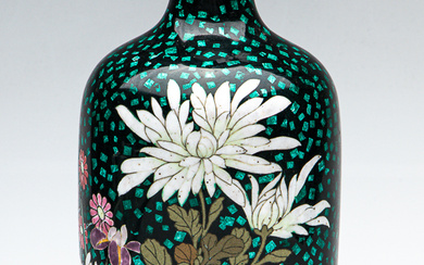 A fine Japanese cloisonne vase decorated with flowers on a...