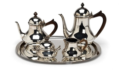 A four piece Dutch silver tea service and a German silver tray