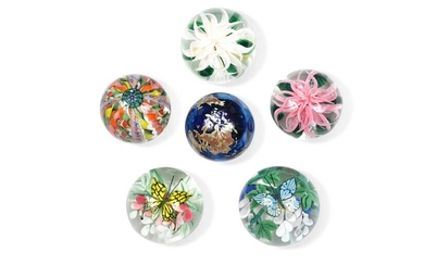 A group of six Lundberg Studio paperweights