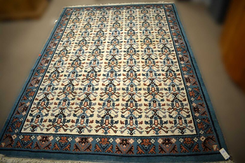 A large Tunisian rug in the Persian style
