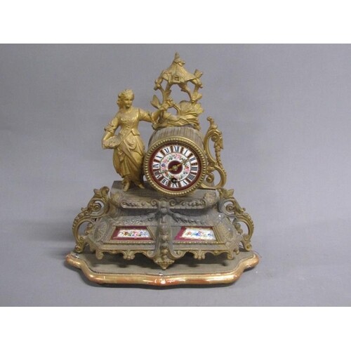 A late 19c French figural mantel clock in gilt spelter case ...