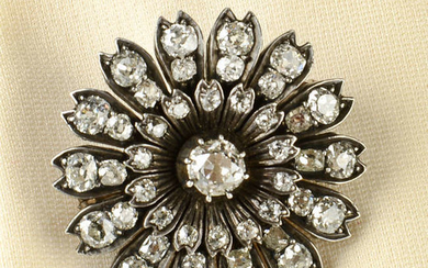 A late Victorian silver and gold old-cut diamond floral brooch.