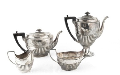 A late Victorian silver four piece tea and coffee service,...