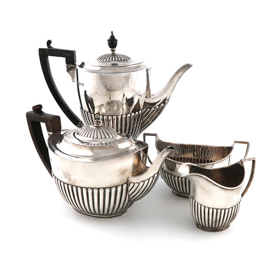 A matched four-piece late-Victorian silver tea and coffee set