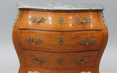 A mid-20th century Rococo chest of drawers.