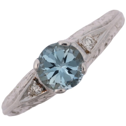 A modern 18ct white gold aquamarine and diamond dress ring, ...