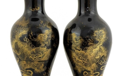 A pair of Chinese black-glazed vases