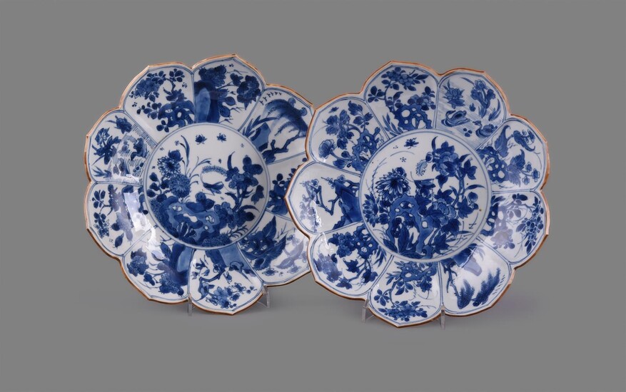 A pair of Chinese porcelain blue and white lotus flower shaped dishes