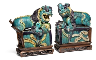 NOT SOLD. A pair of Chinese sancai-glazed pottery lions. Ming 16th-17th century. H. 41 and 43 cm. L. approx. 38 and 43 cm. Fitted hardwood stands. (2) – Bruun Rasmussen Auctioneers of Fine Art