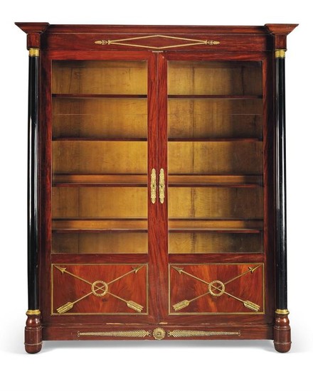 A pair of Empire style mahogany and ebonised display cabinets