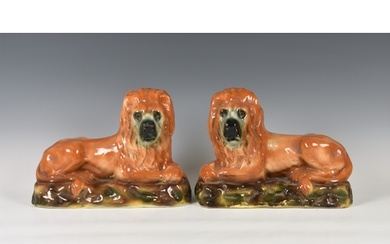 A pair of antique Scottish Bo'ness Pottery recumbent lions, ...