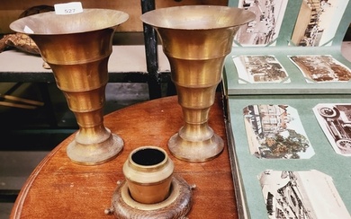A pair of brass vases made by Metador Holland and a small br...