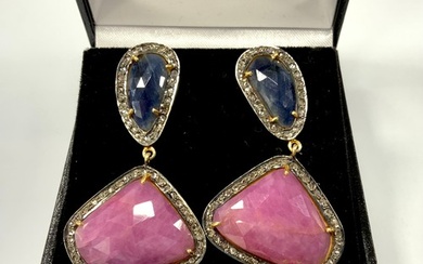 A pair of diamond and corundum earrings, each with a free fo...