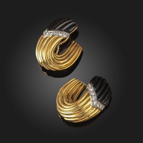 A pair of diamond and onyx-set gold earrings