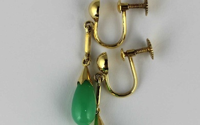 A pair of gold and pale green gem set drop shaped pendant earrings
