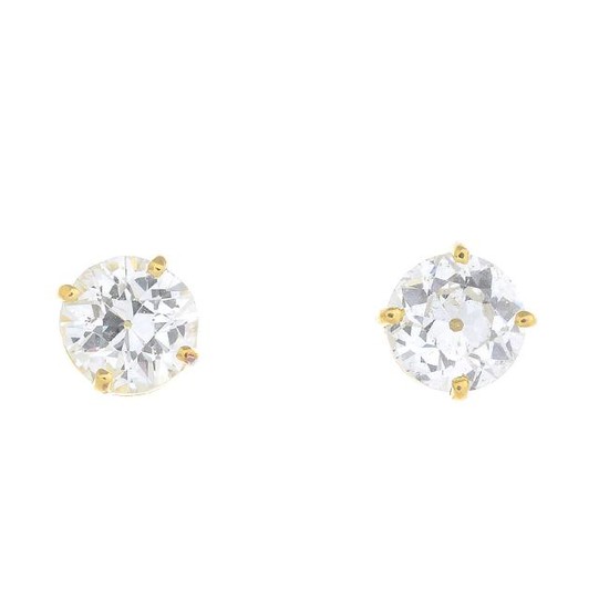 A pair of old-cut diamond stud earrings. Estimated