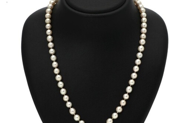 SOLD. A pearl and diamond necklace set with numerous cultured pearls and a clasp set with a diamond, mounted in 14k gold. L. app. 72 cm. – Bruun Rasmussen Auctioneers of Fine Art