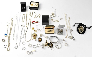 A quantity of costume jewellery to include plated chains, silver...