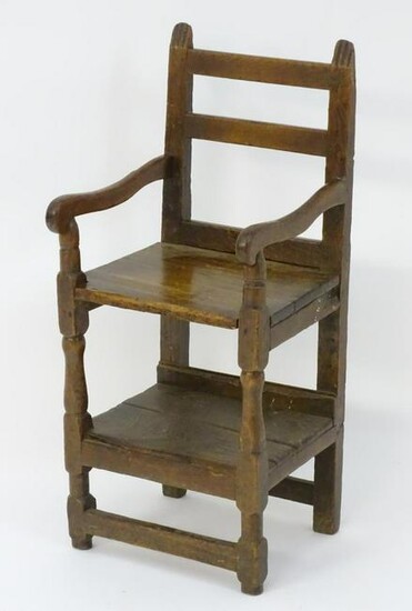 A rare early 18thC mixed wood childs chair, the back