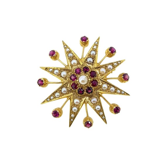 A ruby and pearl star brooch