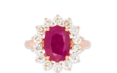 A ruby, diamond and fourteen karat rose gold ring