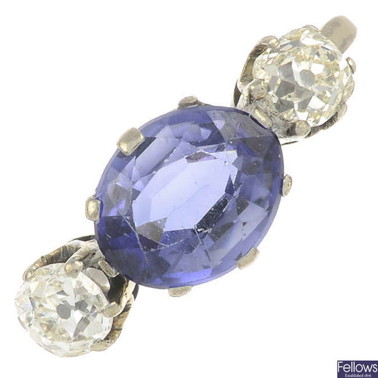 A sapphire and old-cut diamond three stone ring.
