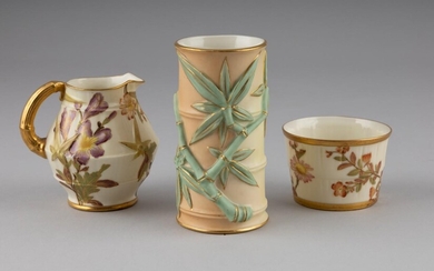 A selection of three Royal Worcester blush ivory items, Height ranges: 2 - 4 3/4 in. (5.08 - 12.07 cm.)