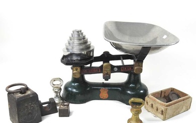 A set of mid 20th century cast iron kitchen scales,...
