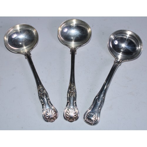A set of three Victorian silver King's pattern sauce ladles,...