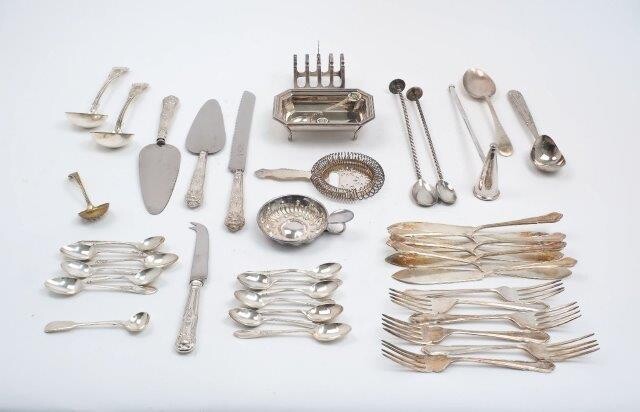 A silver handled bread knife and two silver handled pastry slices, together with a small quantity of silver plate including: an Asprey & Co. cocktail strainer; a candle snuffer; a small toast rack; two cocktail stirring spoons; a wine taster and a...