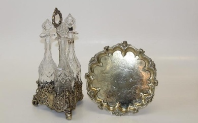 A silver plated decanter set and footed tray.