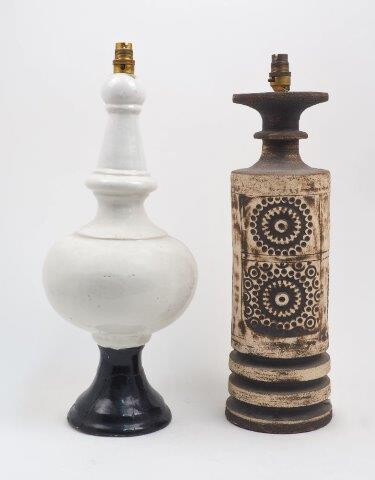 A studio pottery lamp base, 20th century, decorated with impressed geometric motifs in three double panels, with impressed mark for Quantock Pottery at base, 48cm high excluding electrical fittings, together with a white glazed bulbous column...