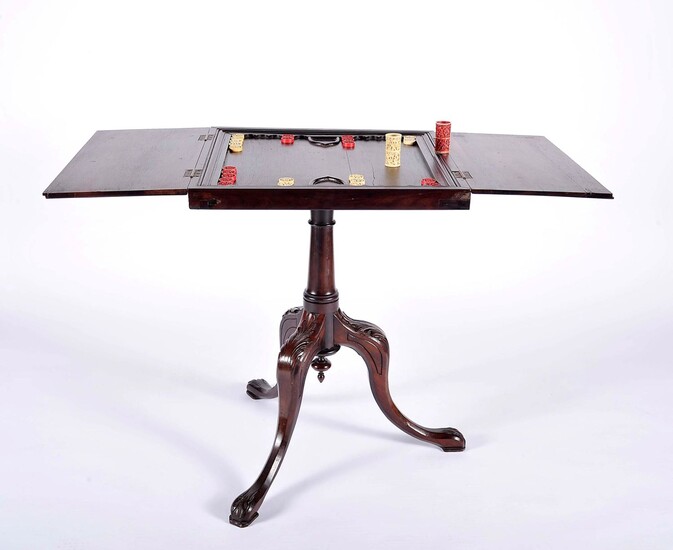 A tripod backgammon table with open top