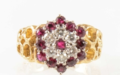 A vintage ruby and diamond circular cluster ring.
