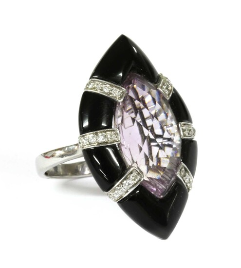 A white gold amethyst, onyx and diamond ring