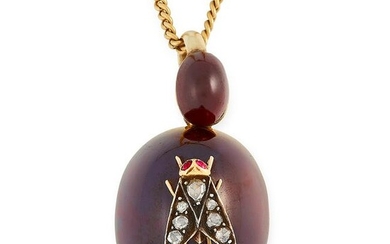 AN ANTIQUE DIAMOND AND GARNET FLY MOURNING LOCKET