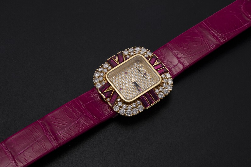 AUDEMARS PIGUET, A LADIES YELLOW GOLD WRISTWATCH SET WITH DIAMONDS AND RUBIES AND A PAVED DIAL