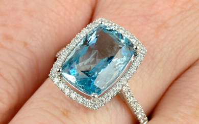 An 18ct gold aquamarine and brilliant-cut diamond dress ring.