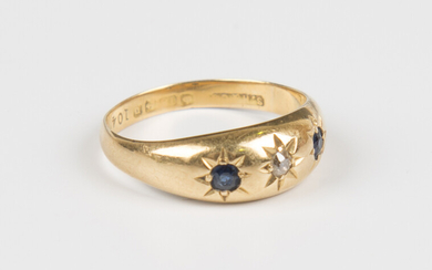 An 18ct gold, sapphire and diamond three stone ring, weight 3g, ring size approx P, with a case.